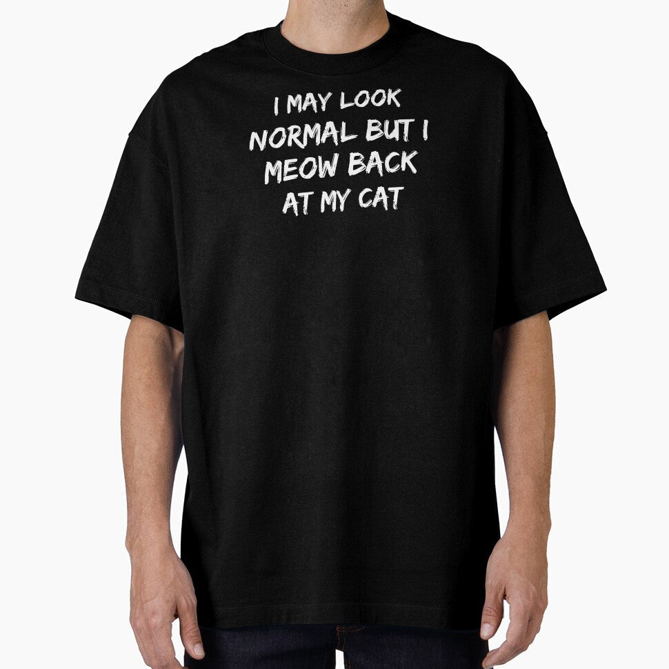 I may look normal but I meow back at my cat by Prima Taftajani